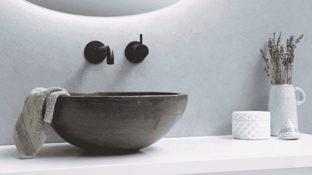Minimalist bathroom sink, representing gentle at-home care for anal fissure symptoms