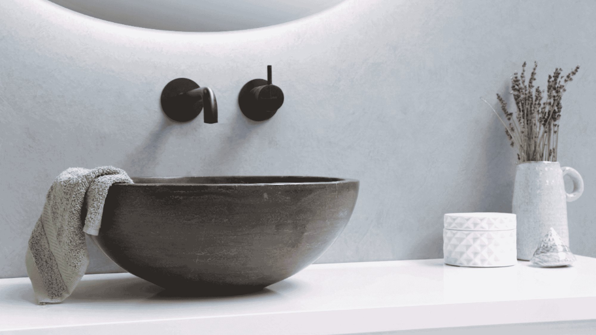 Minimalist bathroom sink, representing gentle at-home care for anal fissure symptoms